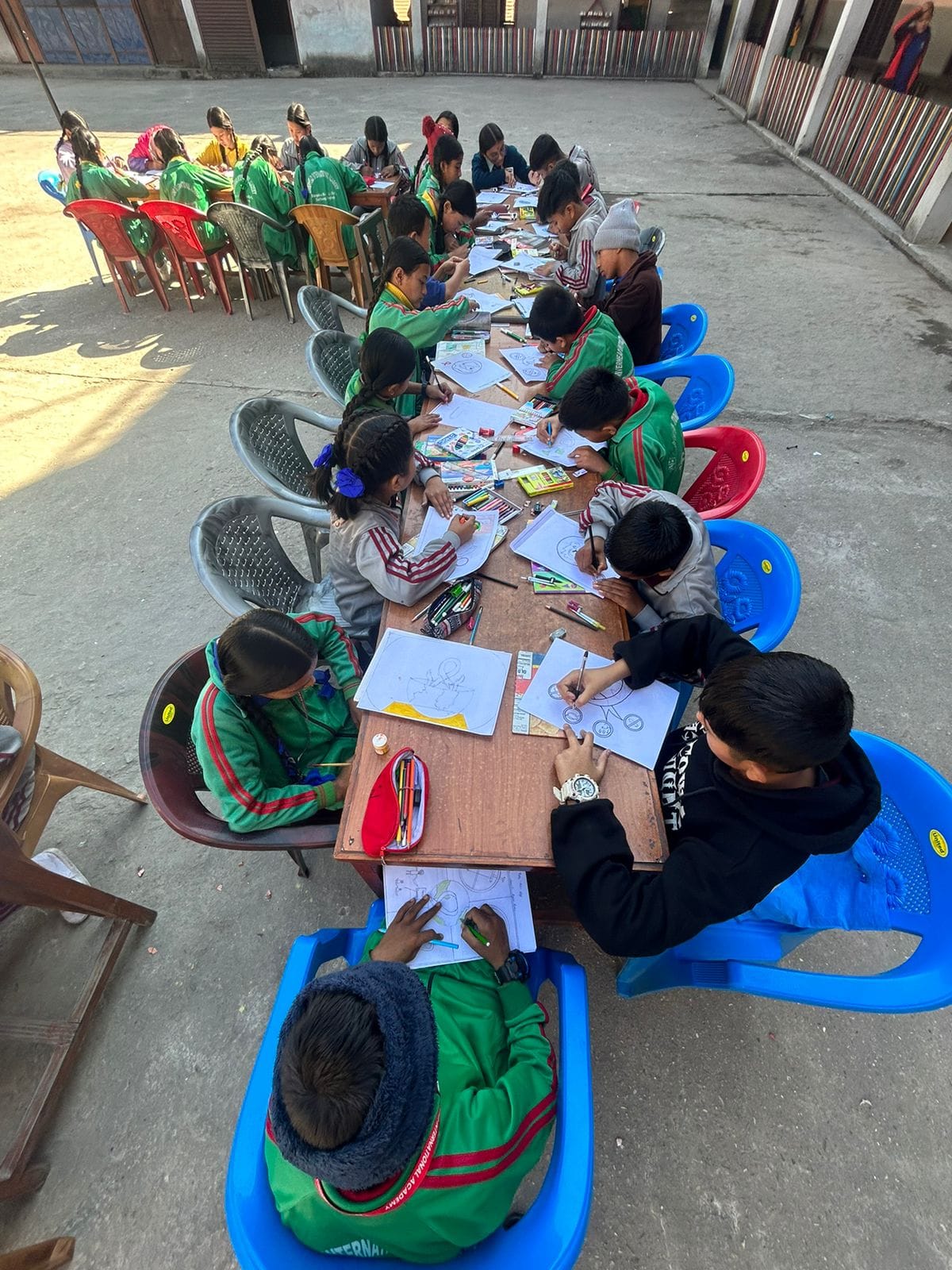 Students participating in drawing contest